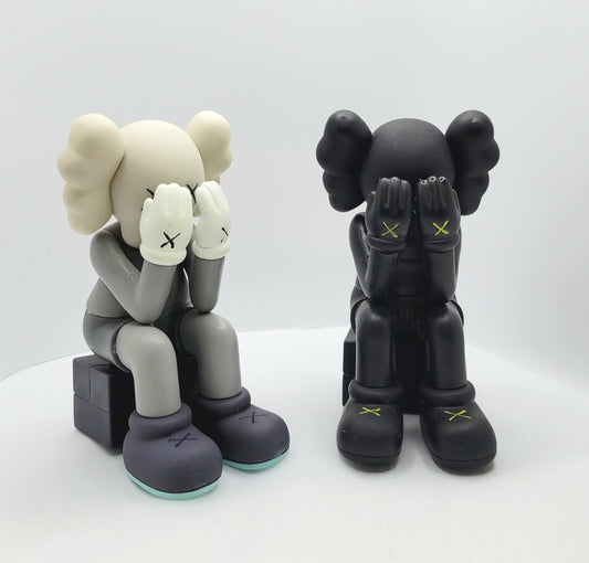 KAWS Seated Vinyl Figure 5 Inches Tall