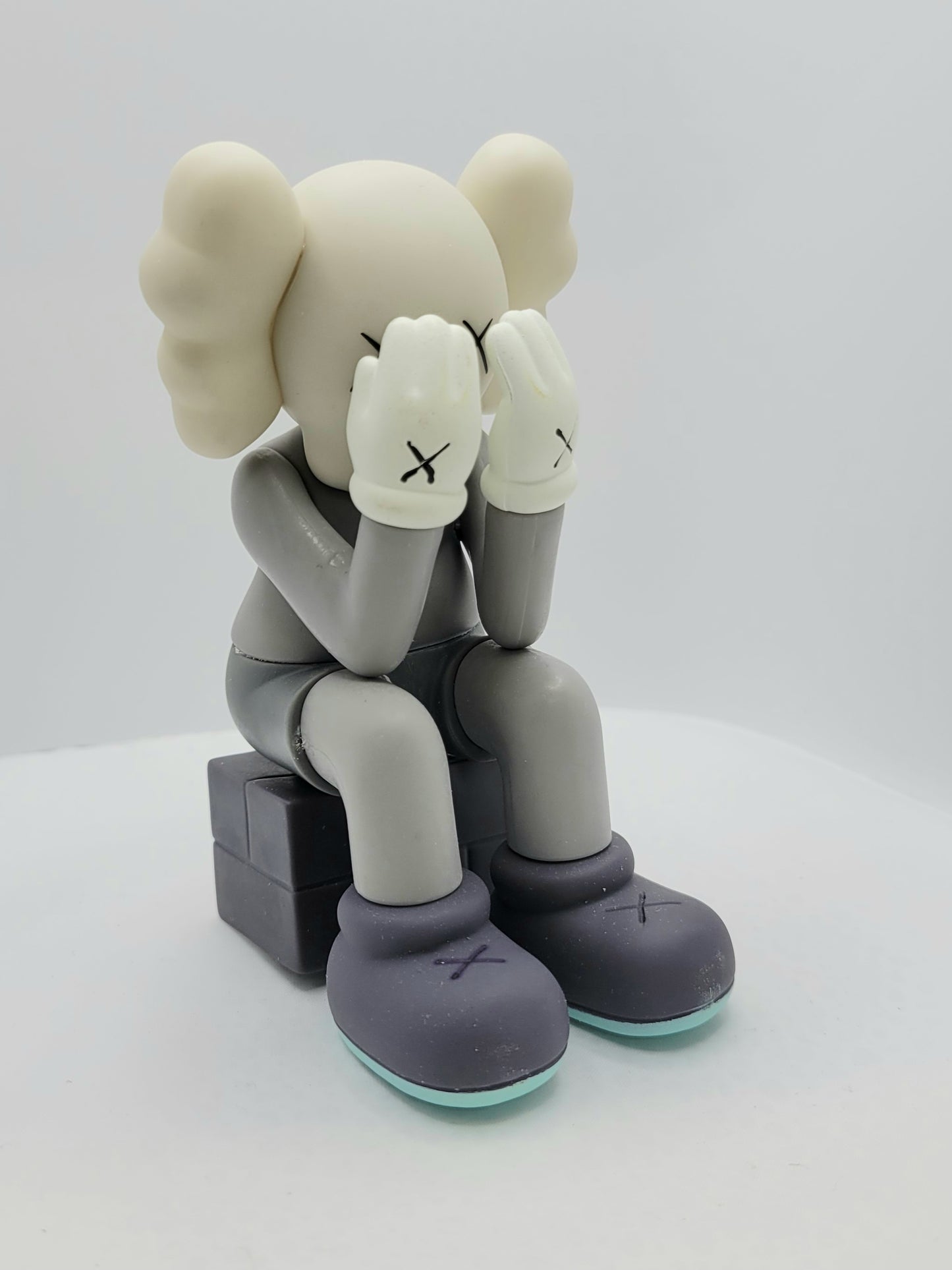 KAWS Seated Vinyl Figure 5 Inches Tall